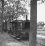 Loc uit de 200 serie met goederentram